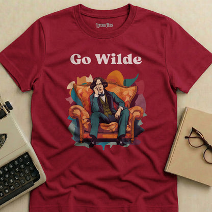 Maroon t-shirt with "Go Wilde" text and illustration of a man in a chair.