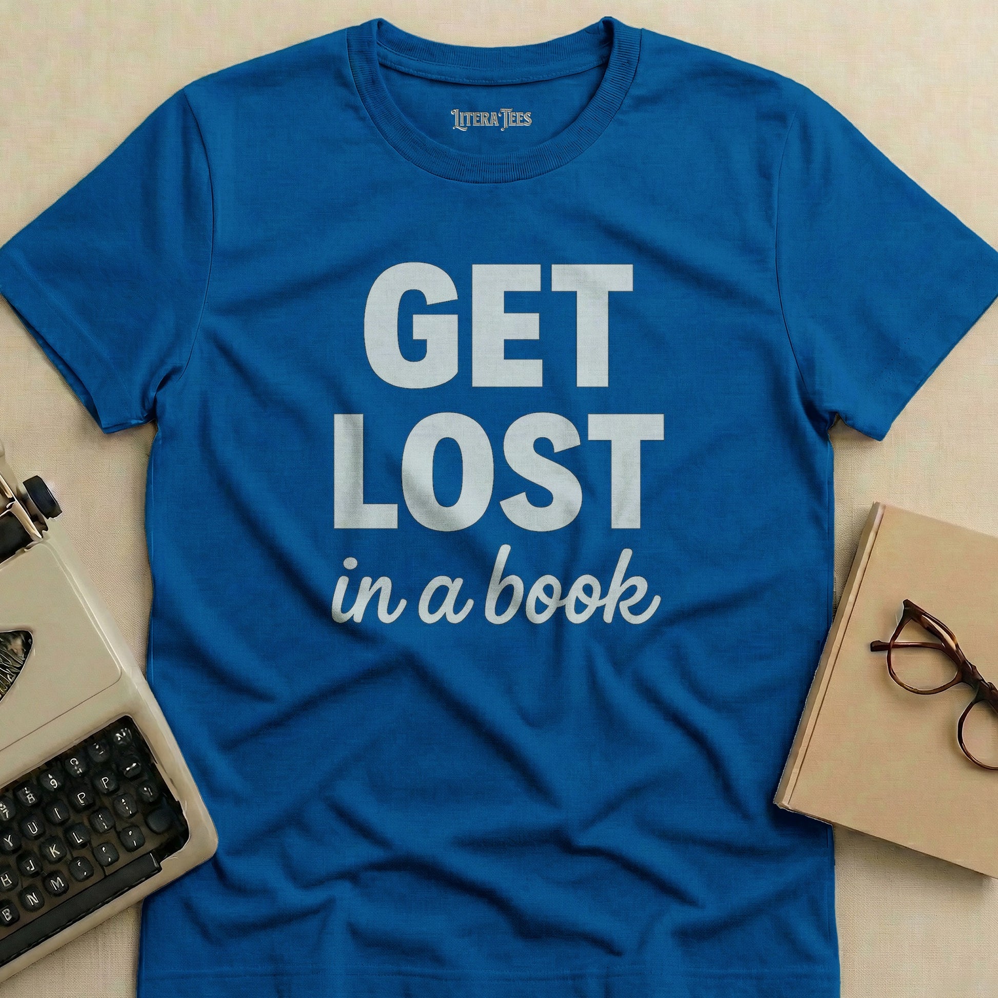 Blue t-shirt with "GET LOST in a book" text.