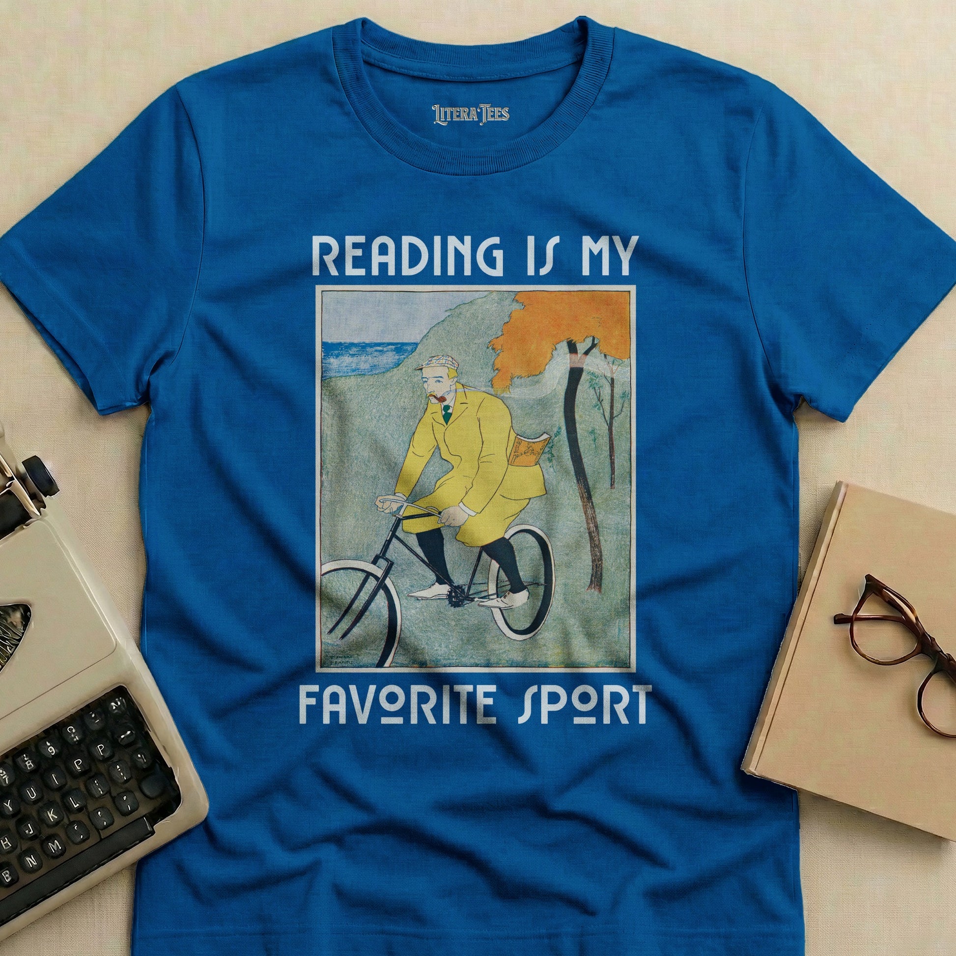 Blue t-shirt with "Reading is my favorite sport" text and vintage cycling illustration.