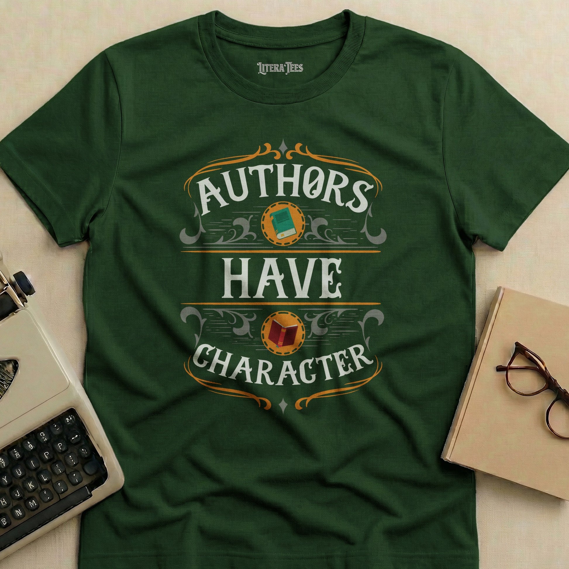 Green t-shirt with "Authors Have Character" text and typewriter, book, glasses.