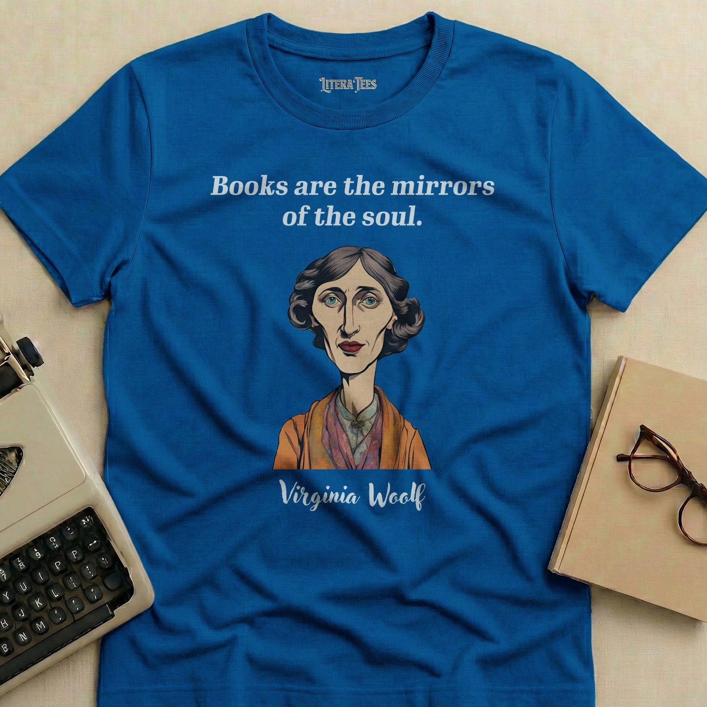 Blue t-shirt with Virginia Woolf portrait and quote "Books are the mirrors of the soul."