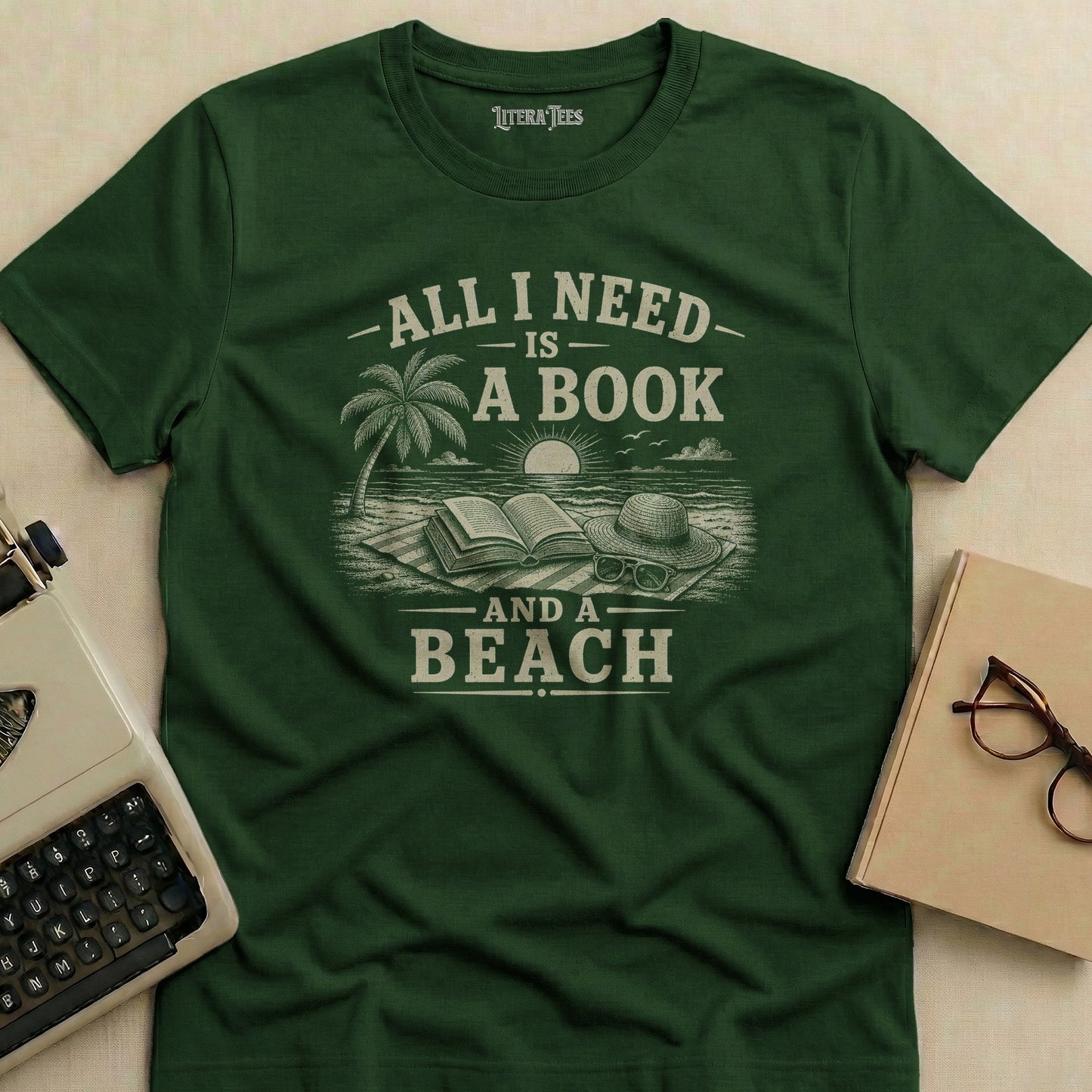 Dark green t-shirt with "All I Need Is A Book And A Beach" text and beach scene.