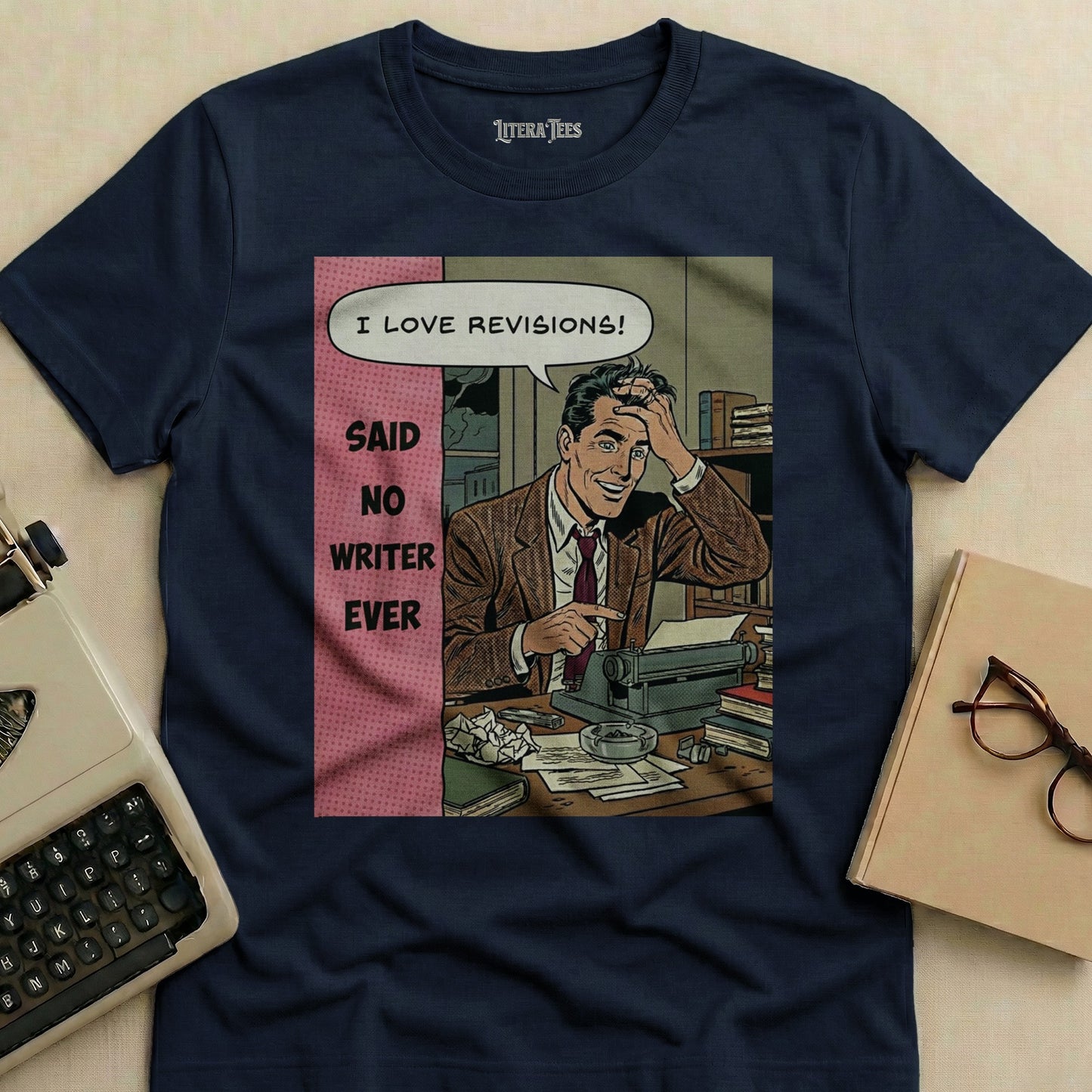 T-shirt with a comic-style illustration of a man at a typewriter, saying "I love revisions!"