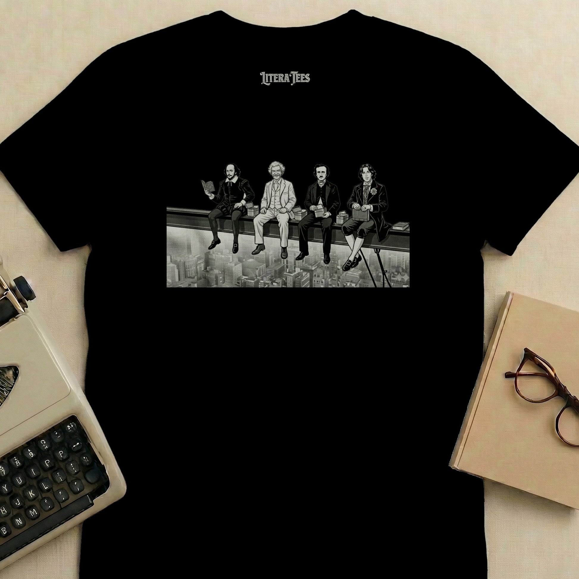 Four authors sit on a beam high above a city on a black t-shirt.