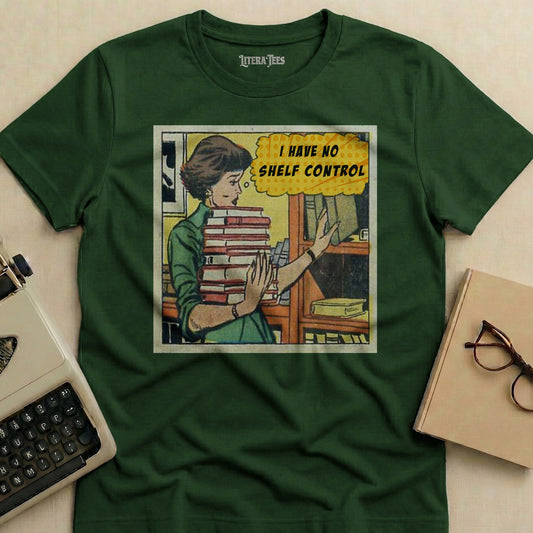 Green t-shirt with comic art of woman holding books and text "I HAVE NO SHELF CONTROL".