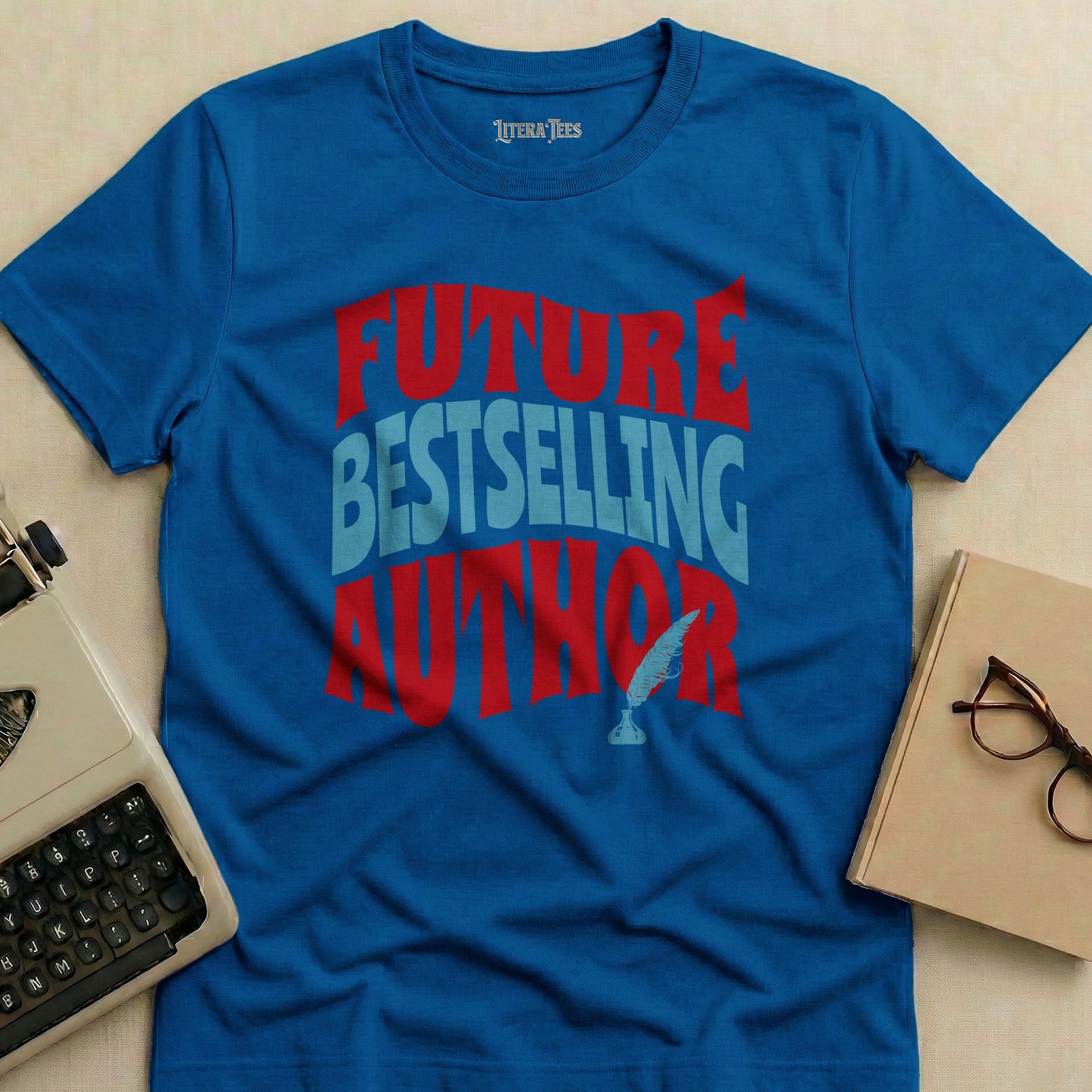 Blue t-shirt with "FUTURE BESTSELLING AUTHOR" text and feather quill graphic.