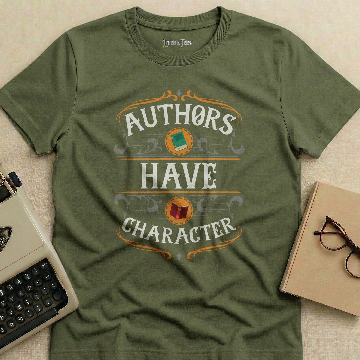 Olive green t-shirt with "AUTHORS HAVE CHARACTER" text and book graphic.