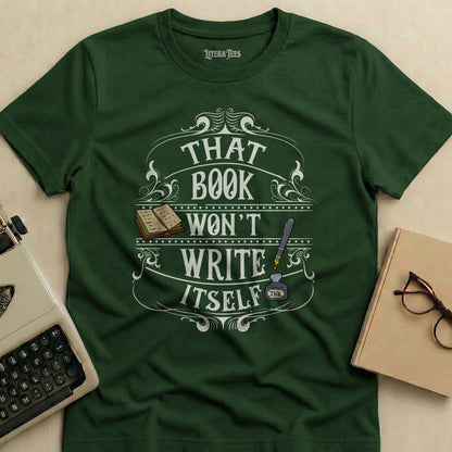 Green t-shirt with "That Book Won't Write Itself" text and quill pen graphic.