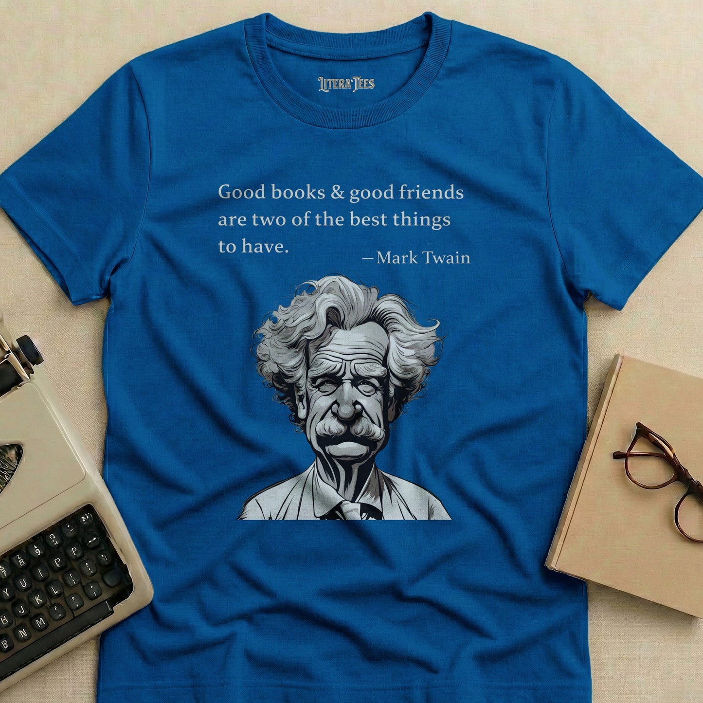 Blue t-shirt with Mark Twain quote and portrait.