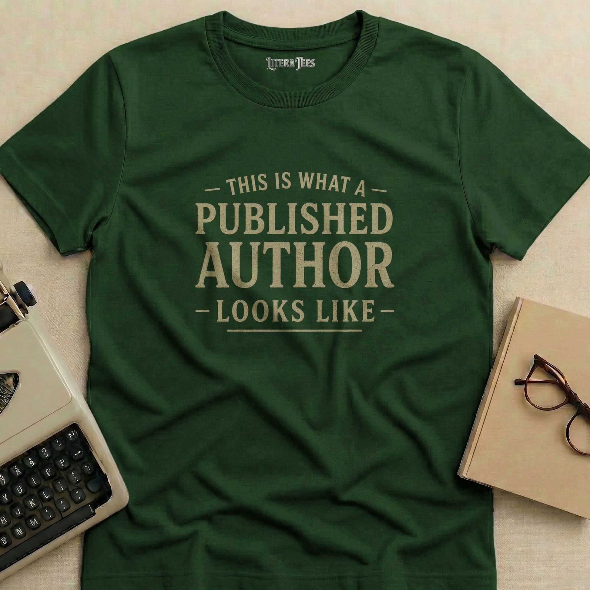 Green t-shirt with "This is what a published author looks like" text.