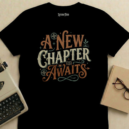 Black t-shirt with "A New Chapter Awaits" in vintage lettering.