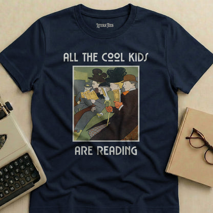 Navy t-shirt with "ALL THE COOL KIDS ARE READING" text and illustration.
