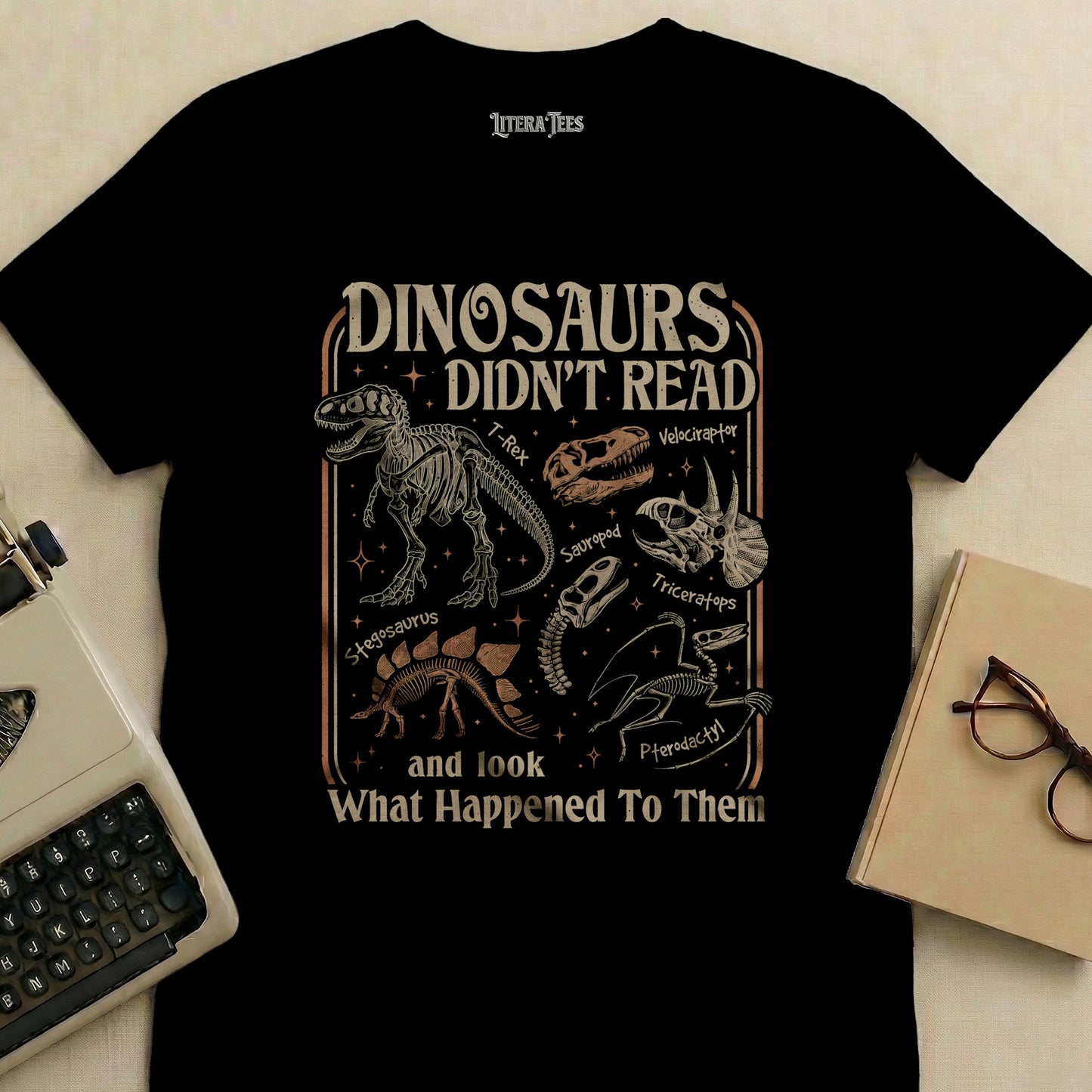 T-shirt graphic with "DINOSAURS DIDN'T READ" and dinosaur illustrations.