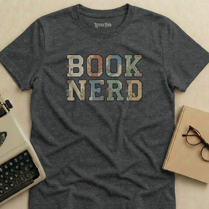 Dark t-shirt with "BOOK NERD" in textured, colorful block letters.