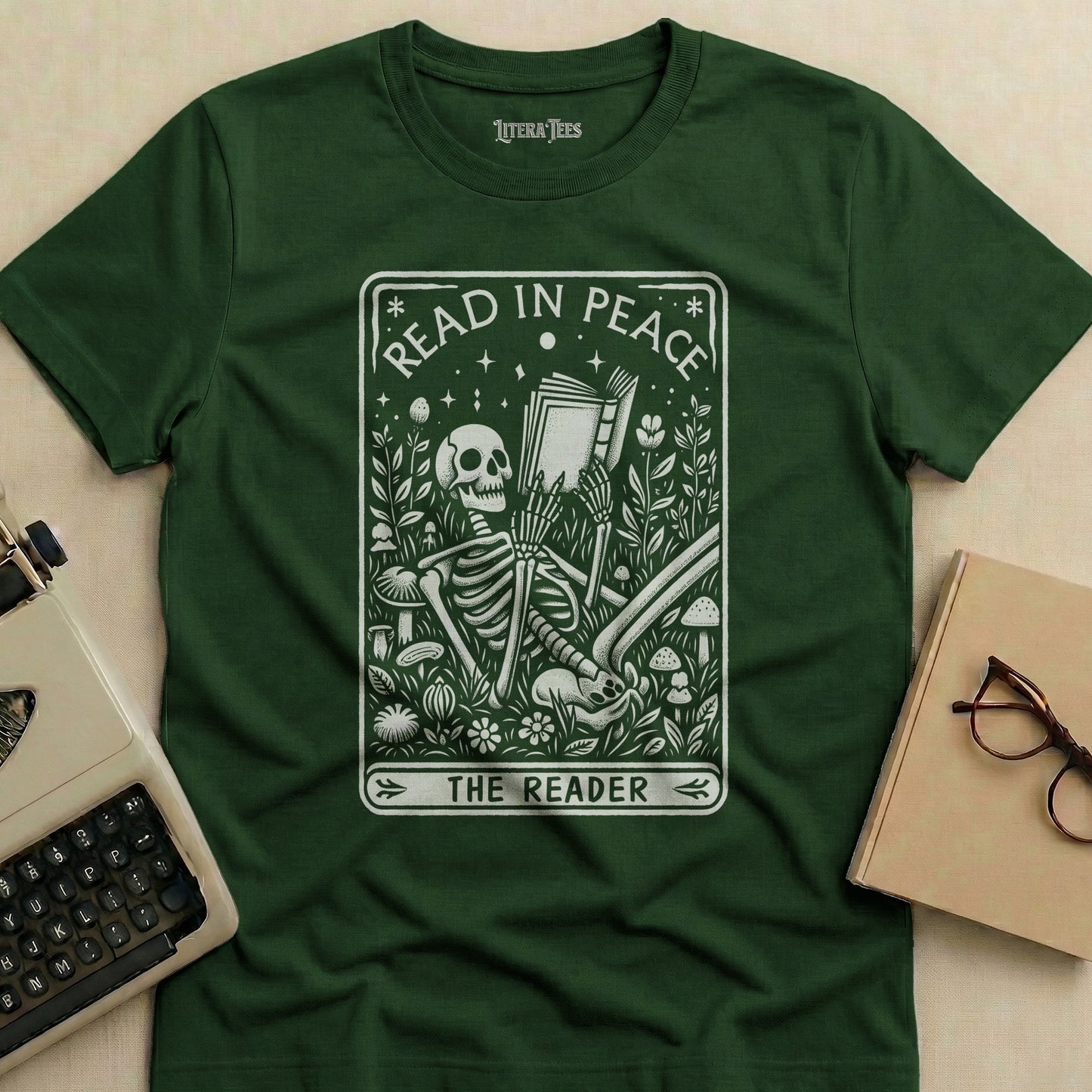 Green t-shirt with "Read in Peace The Reader" skeleton reading graphic.