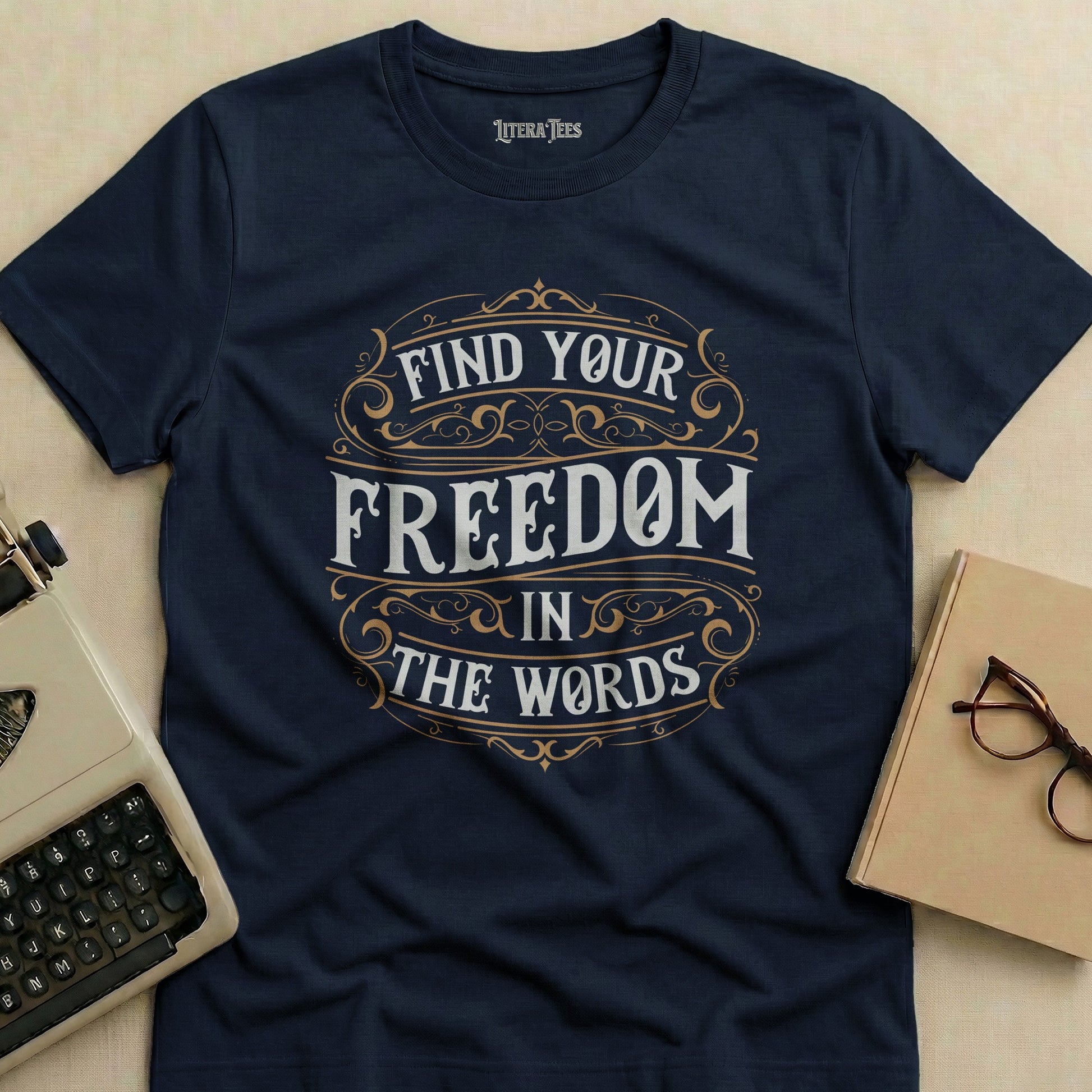 Navy t-shirt with "Find Your Freedom In The Words" text.
