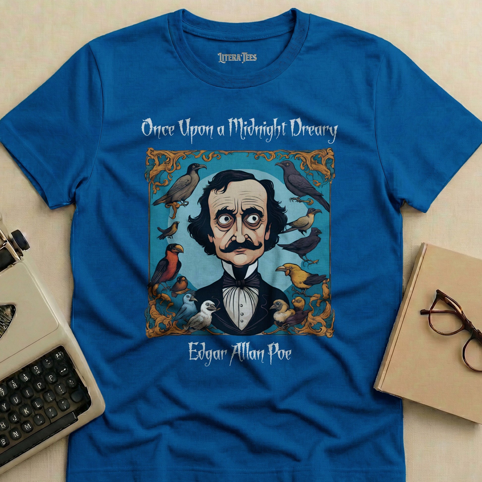Blue t-shirt featuring Edgar Allan Poe illustration and text.