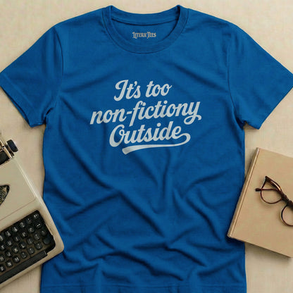 Royal blue t-shirt with "It's too non-fictiony Outside" text.