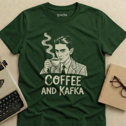 Dark green t-shirt with white text "COFFEE AND KAFKA" and drawing of a man drinking coffee.