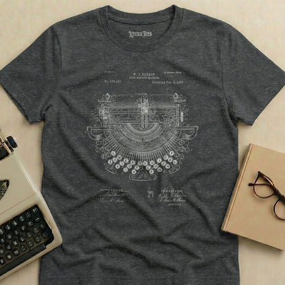 Dark t-shirt with vintage typewriter patent diagram design.