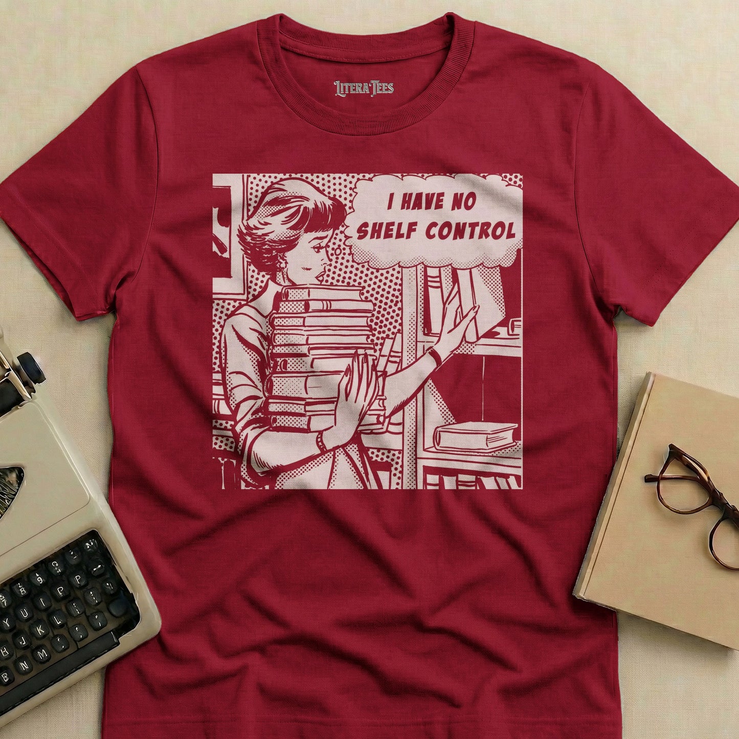 T-shirt with comic panel illustration and text "I HAVE NO SHELF CONTROL".