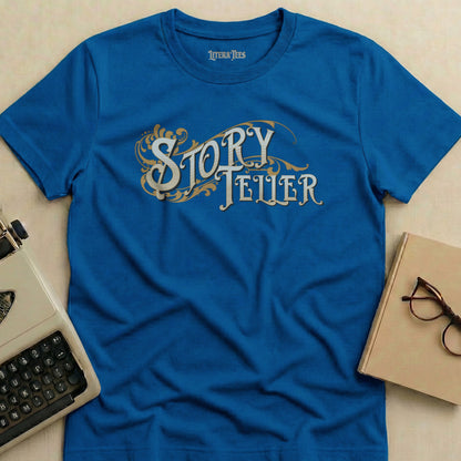 Blue t-shirt with "Story Teller" text and ornate flourishes.