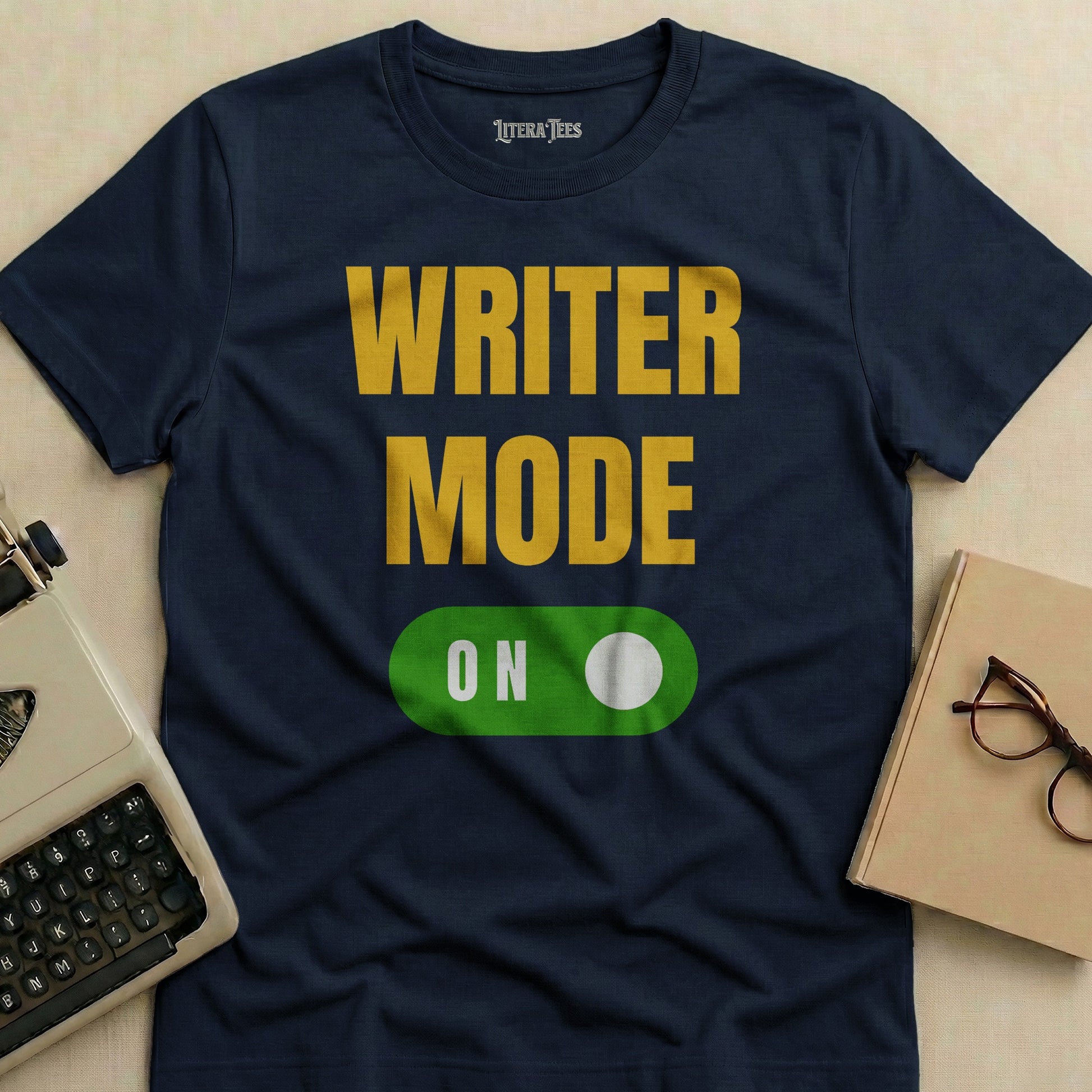 Dark t-shirt with "WRITER MODE ON" and a toggle switch.