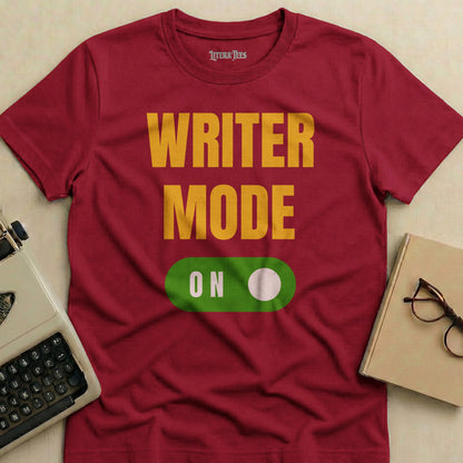 Burgundy t-shirt with "WRITER MODE ON" text and a toggle switch.