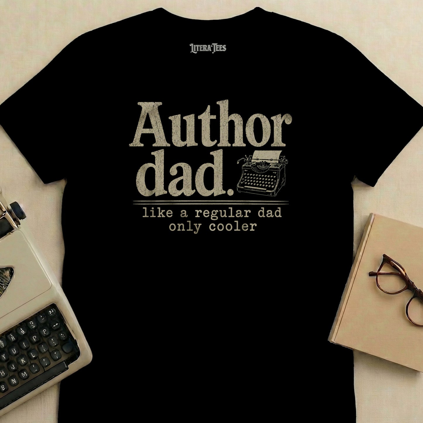Black t-shirt with "Author dad. like a regular dad only cooler" text.