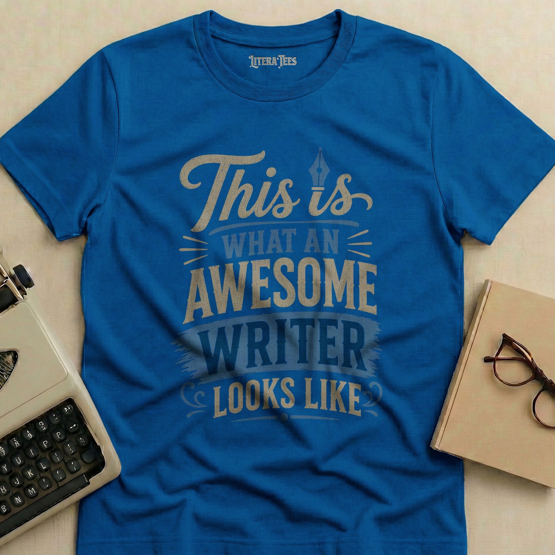 Blue t-shirt with "This is what an awesome writer looks like" text.
