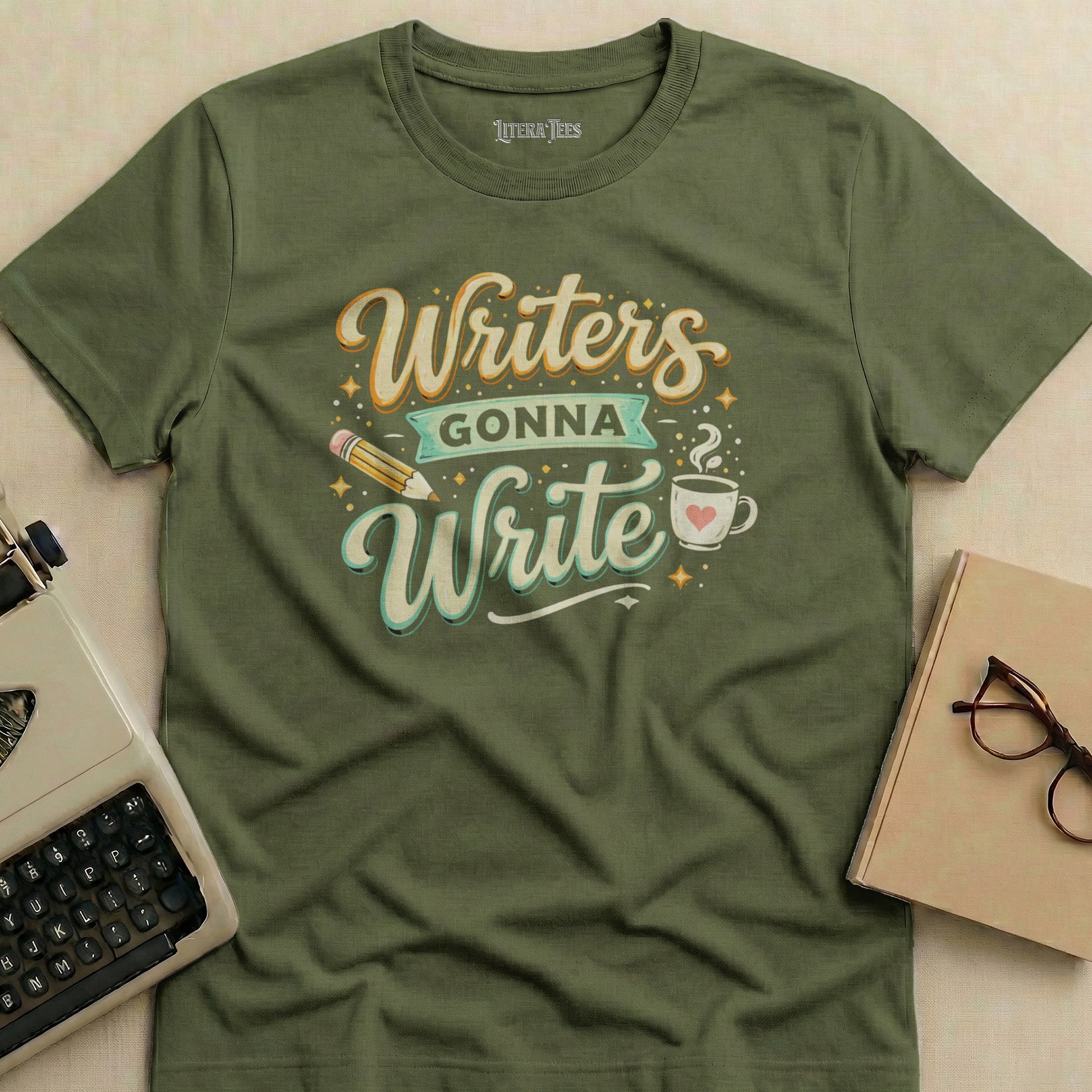 Olive green t-shirt with "Writers Gonna Write" text and pencil graphic.