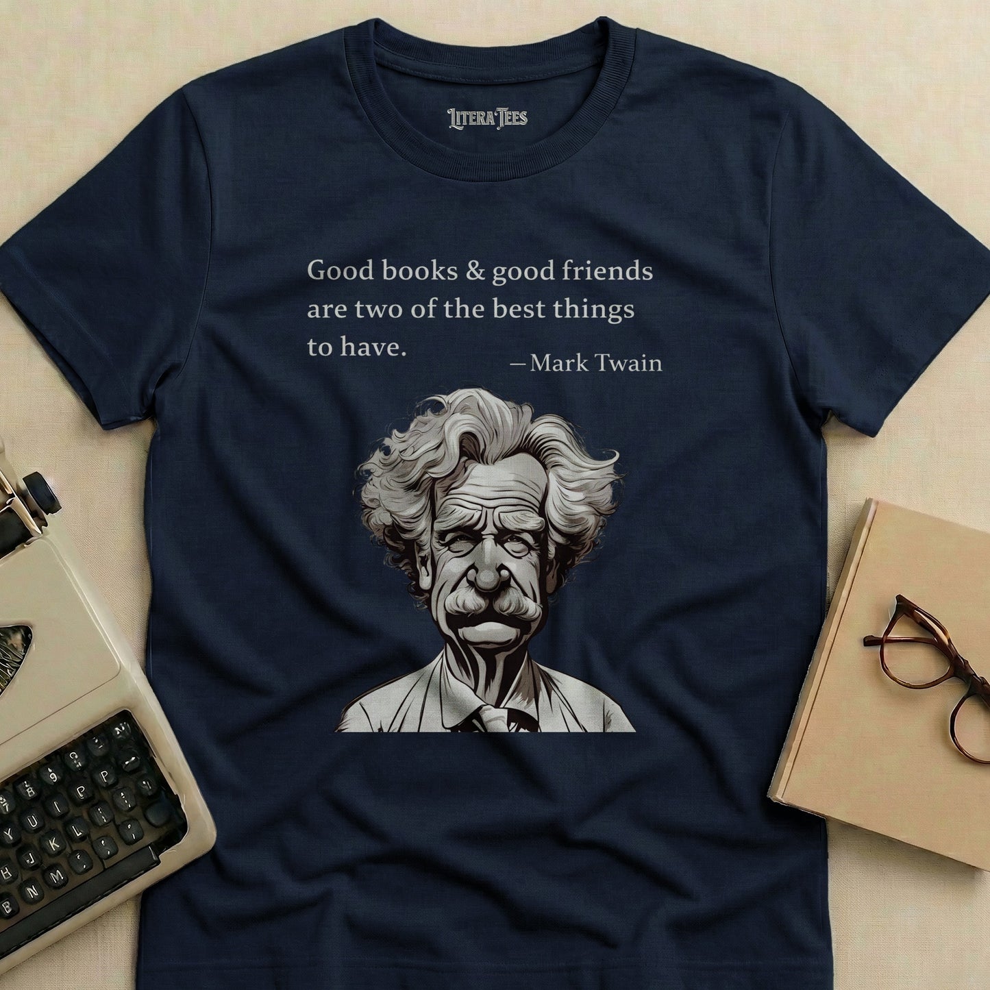 Navy t-shirt with Mark Twain quote and portrait.