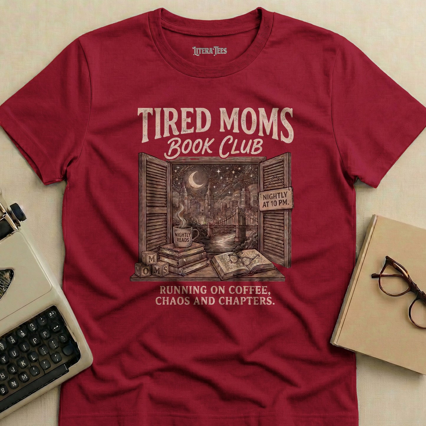 Burgundy t-shirt with "Tired Moms Book Club" text and coffee/book graphics.