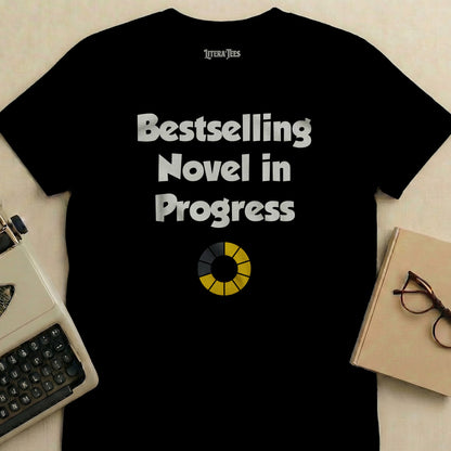 Black t-shirt with "Bestselling Novel in Progress" and a loading bar.