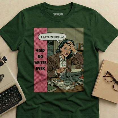 Green t-shirt with a comic-style print of a woman saying "I love revisions!".