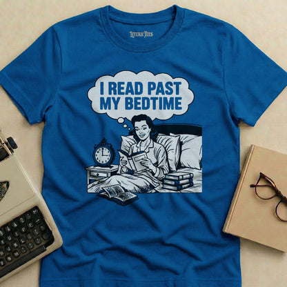 Blue t-shirt with cartoon of woman reading in bed, text "I read past my bedtime".