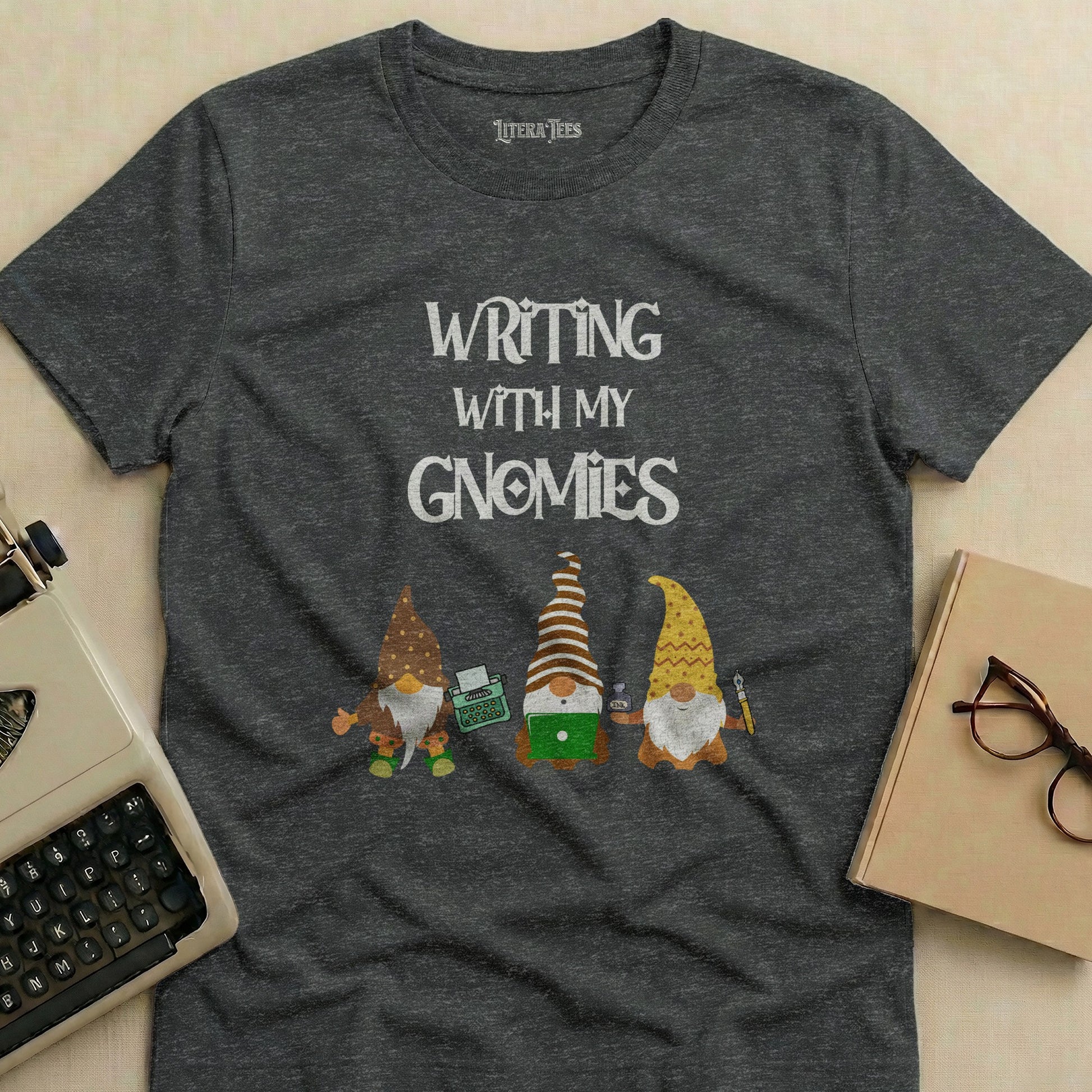 Dark grey t-shirt with "Writing With My Gnomies" and three gnomes.
