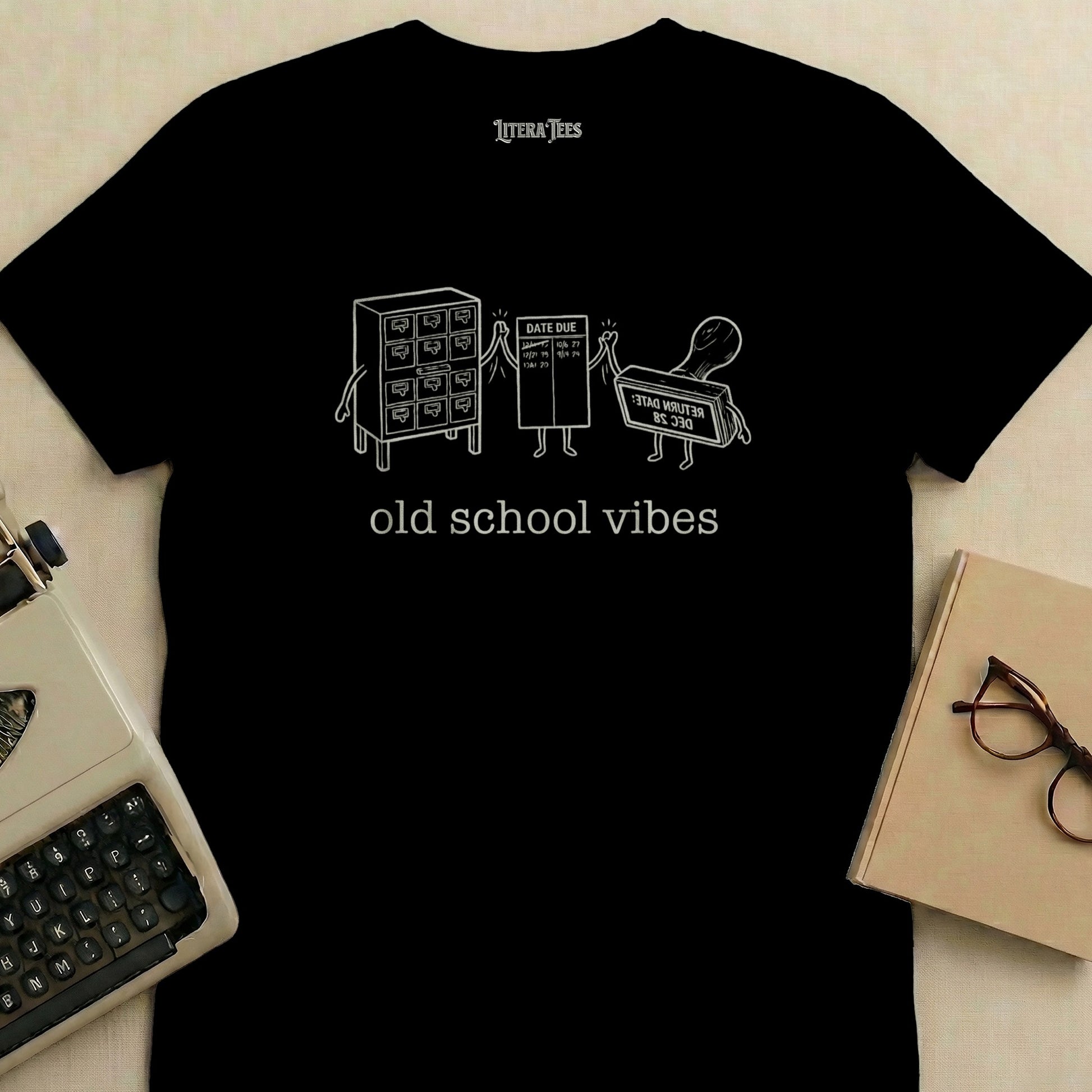 Black t-shirt with "old school vibes" and drawing of a filing cabinet and stamp.