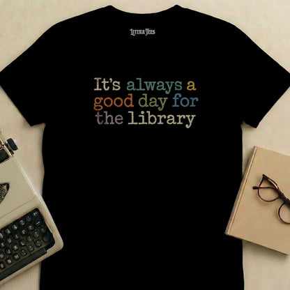 Black t-shirt with "It's always a good day for the library" text.