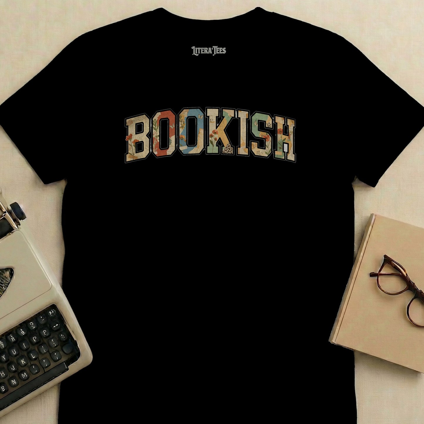 Black t-shirt with "BOOKISH" in floral collegiate lettering.