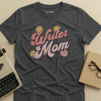 "Writer Mom" text on a charcoal t-shirt with floral accents.