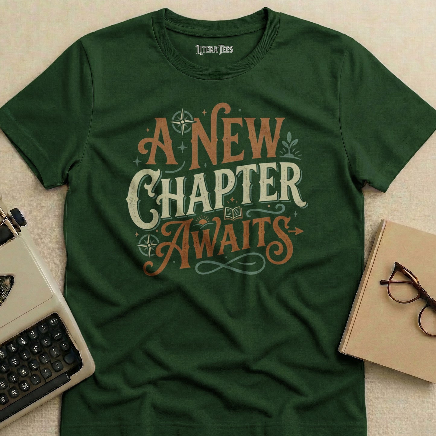 Green t-shirt with "A New Chapter Awaits" text and literary graphic.