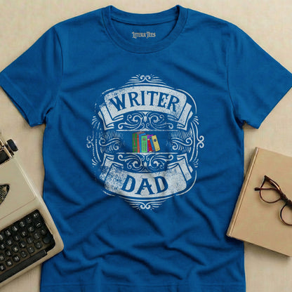 Blue t-shirt with "WRITER DAD" text and stack of books.