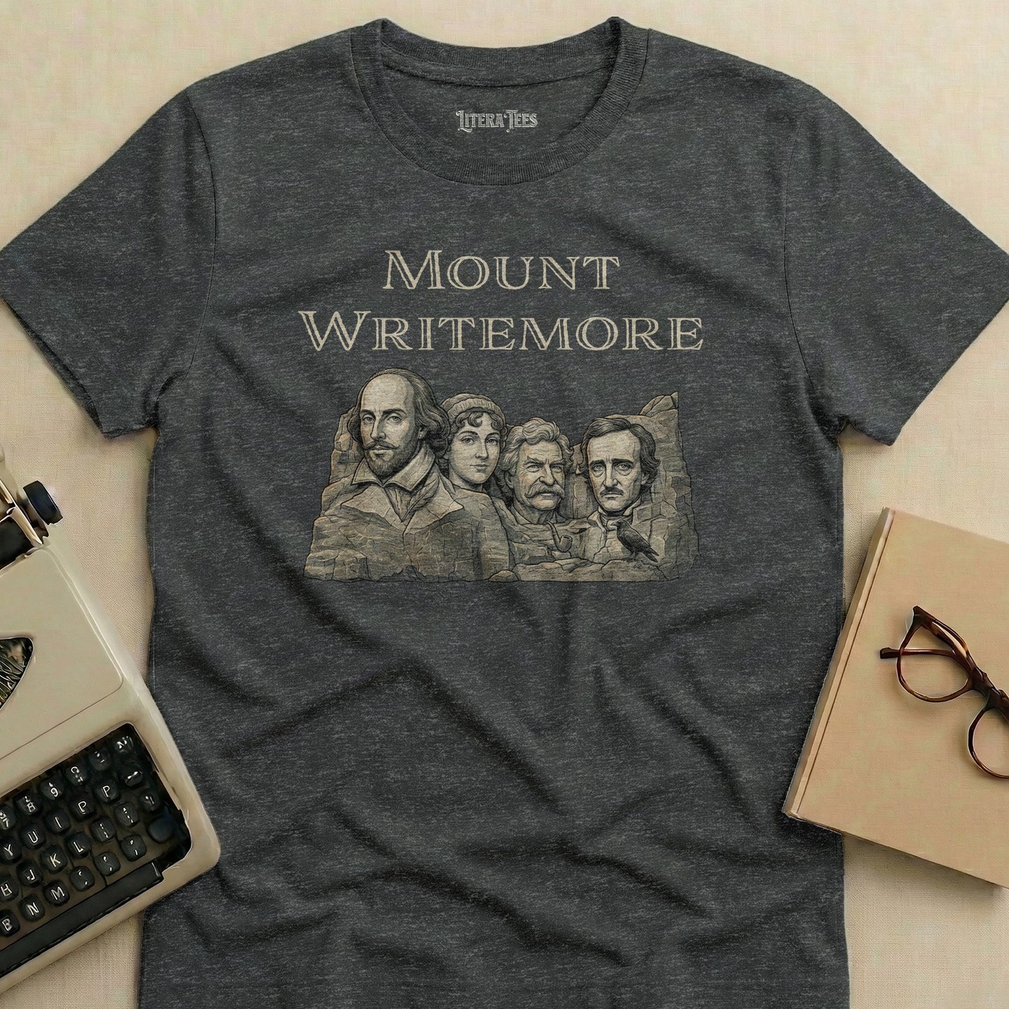 Dark grey t-shirt with Mount Whitemore featuring literary figures.