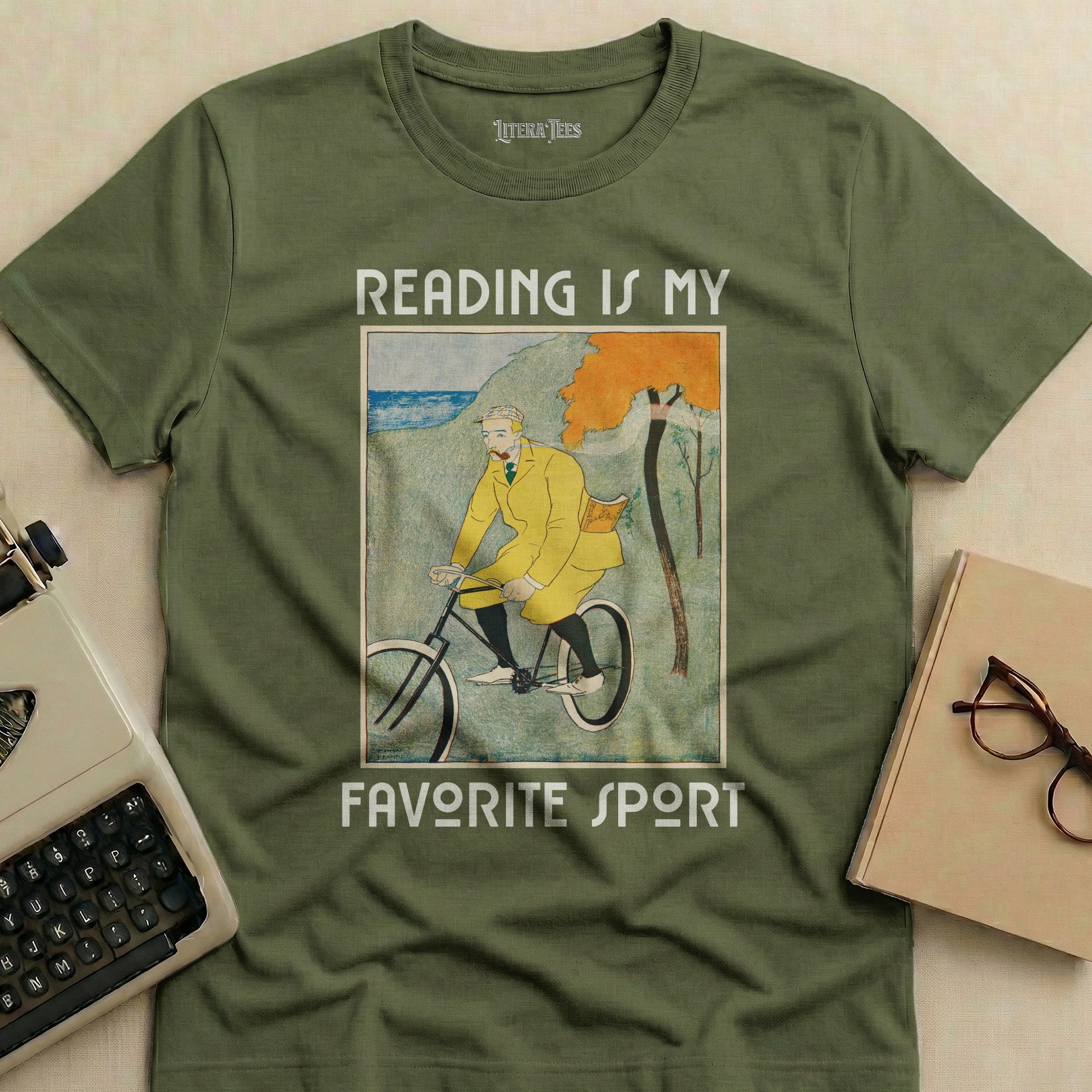 Olive green t-shirt with "Reading is my favorite sport" and a vintage cyclist illustration.