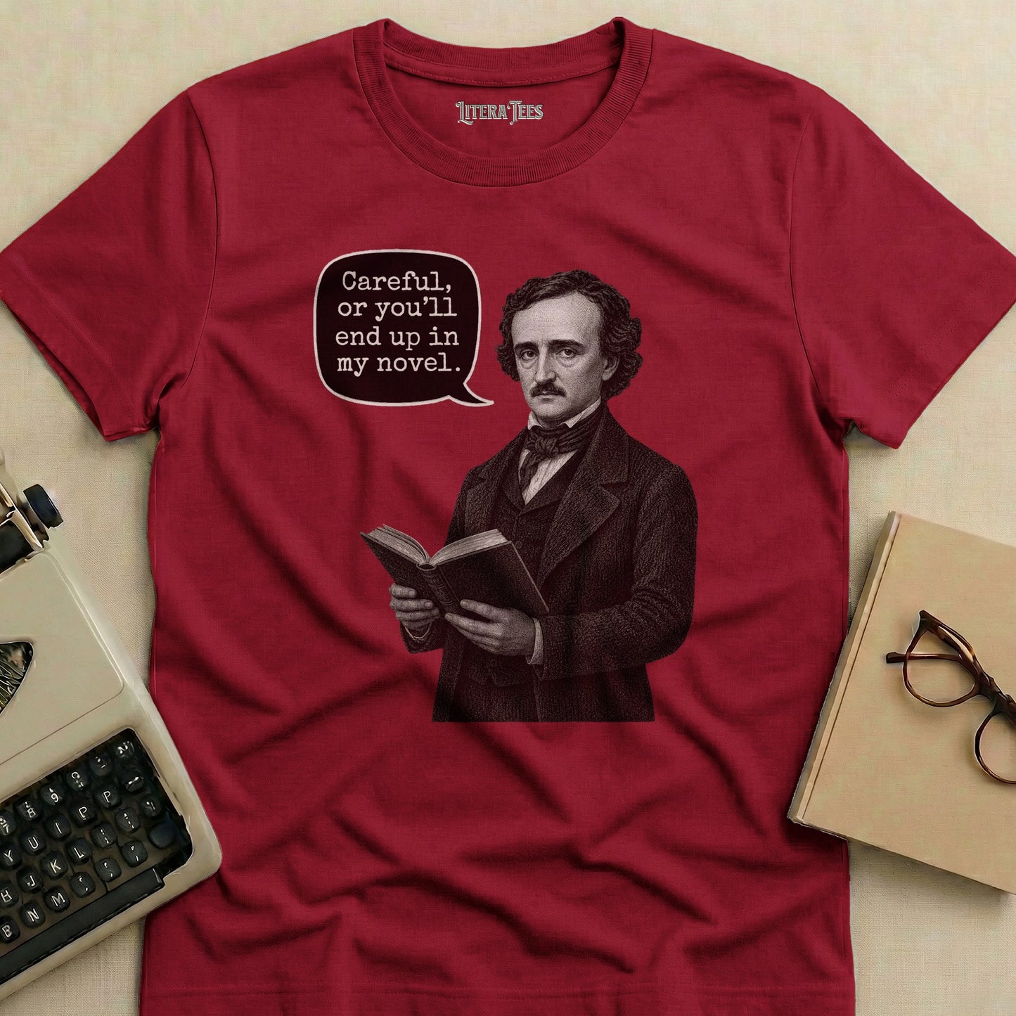 Edgar Allan Poe graphic on a red t-shirt reading "Careful, or you'll end up in my novel."