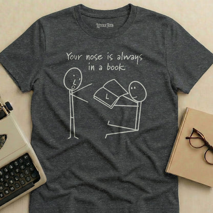 T-shirt with stick figures and text "Your nose is always in a book".