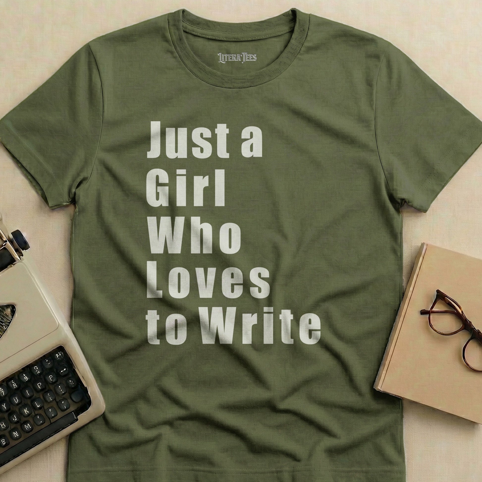Green t-shirt with "Just a Girl Who Loves to Write" in white text.