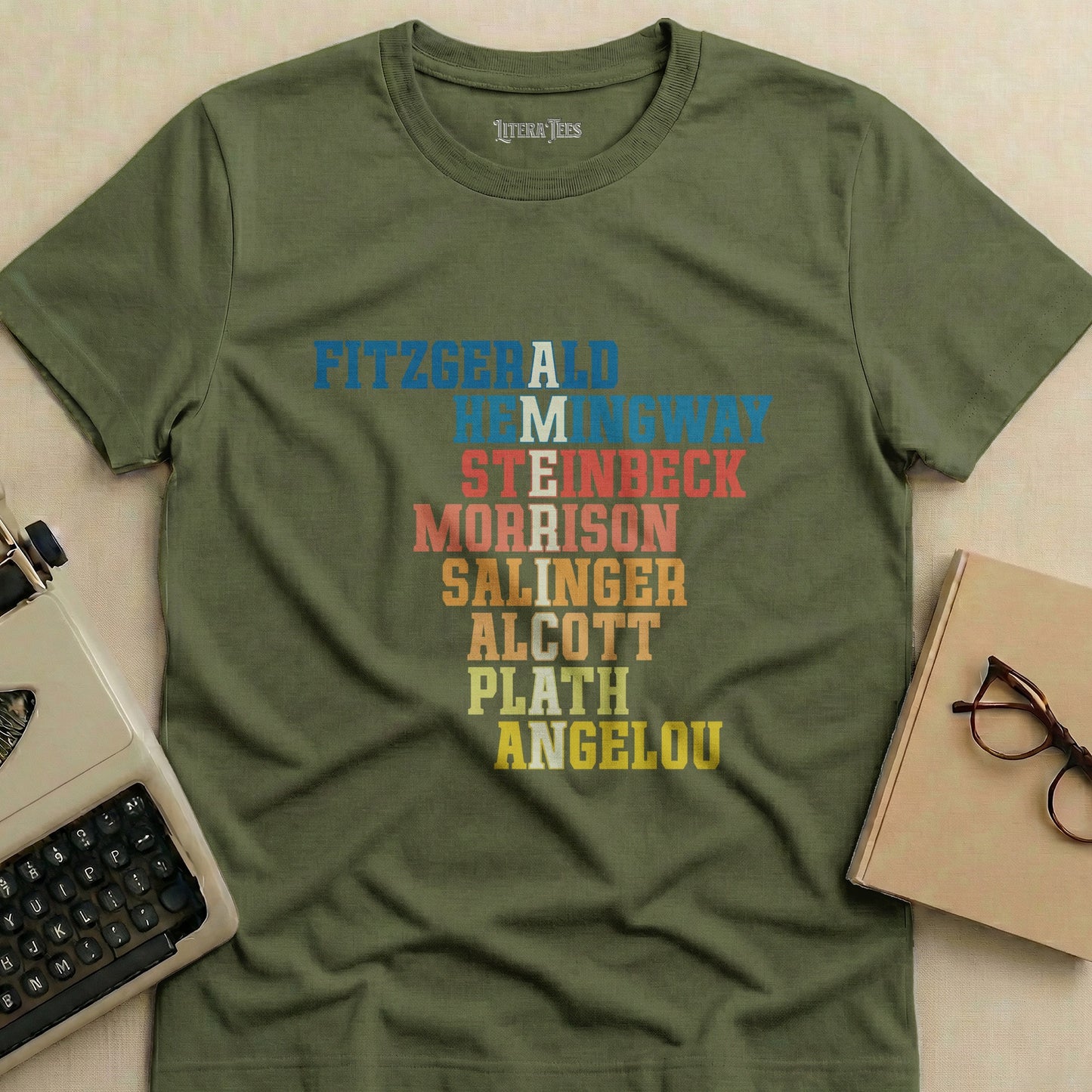 Olive green t-shirt with famous author names printed vertically.