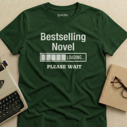 Dark green t-shirt with "Bestselling Novel LOADING... PLEASE WAIT" text.